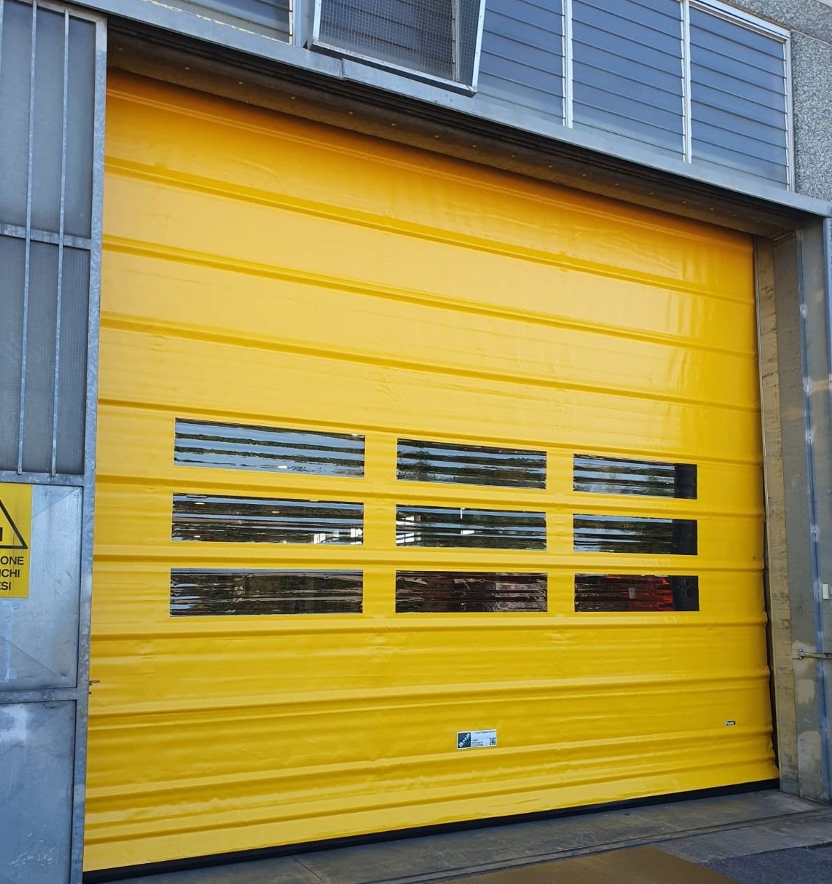 Porta rapida industriale ad impacchettamento